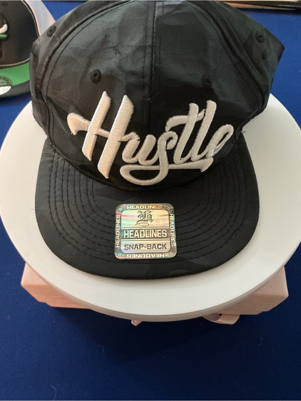 Black 'Hustle' Snapback Cap with White Embroidered Script